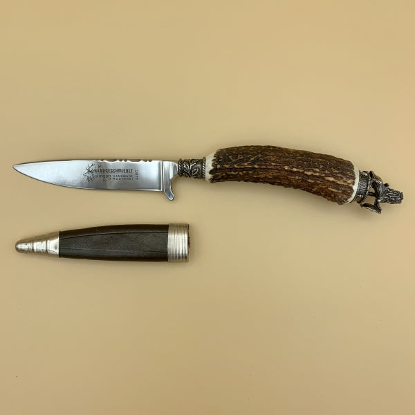 Trachtenmesser mit Horngriff und Kappe mit stehendem Löwen und Wappen, mit Lederscheide