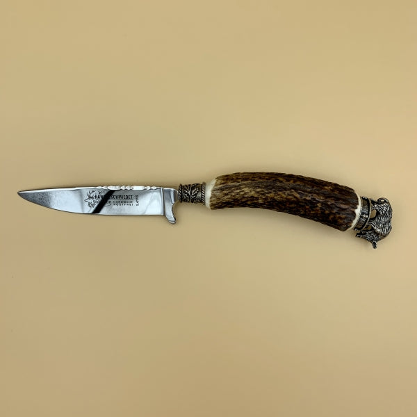 Trachtenmesser „Eber“ mit Horngriff und massiver Kappe mit Eberkopf