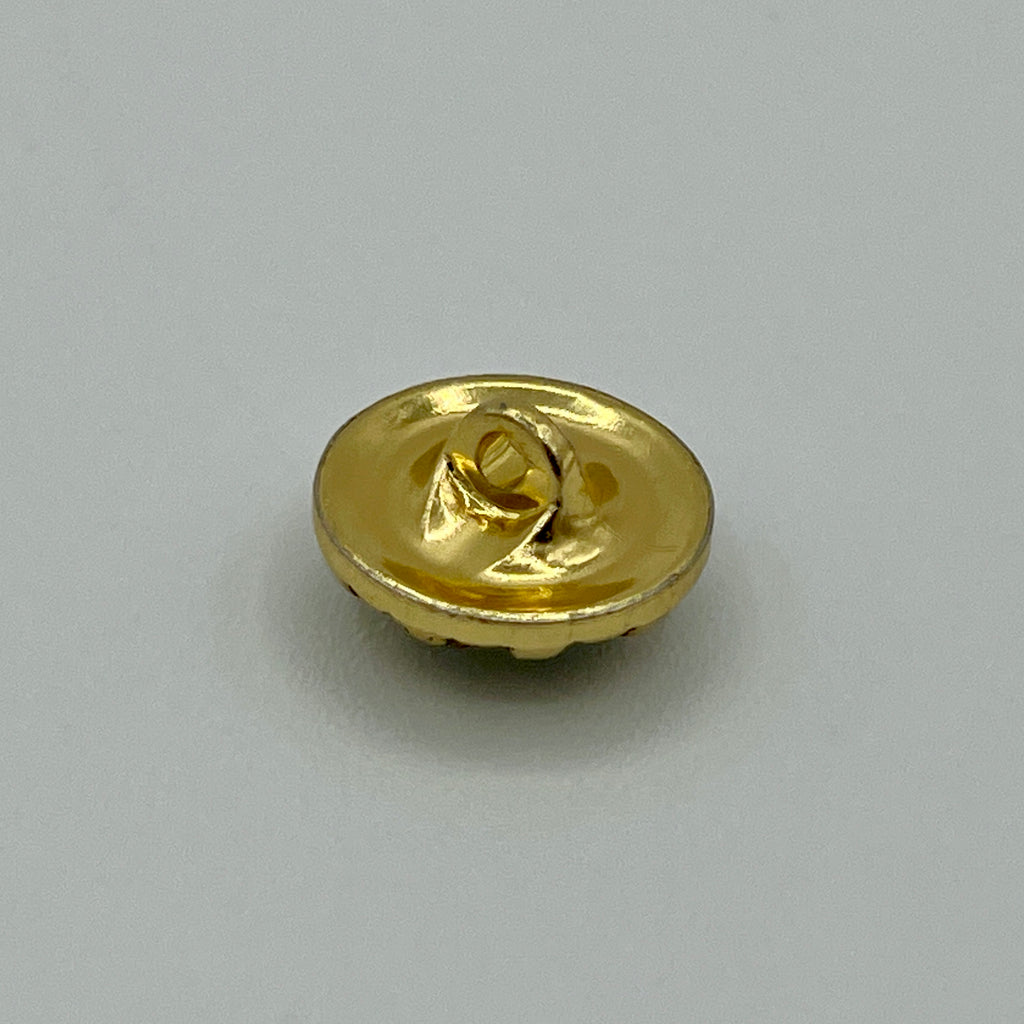 Zierknopf in Goldoptik mit facettiertem Kristallstein in geriffelter Fassung