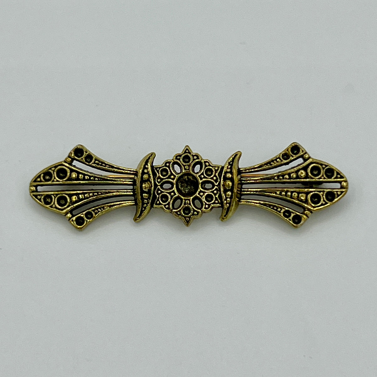 Lange Ornament-Anstecknadel im Antik-Messing-Look